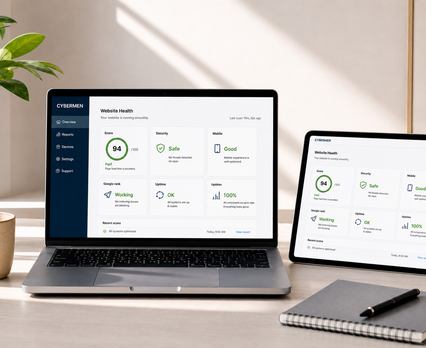 Laptop and tablet showing a Cybermen website health dashboard